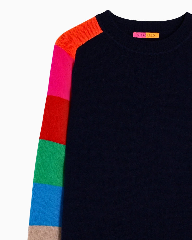 Closed-up Vilagallo navy wool jumper showing ribbed hem and striped sleeves