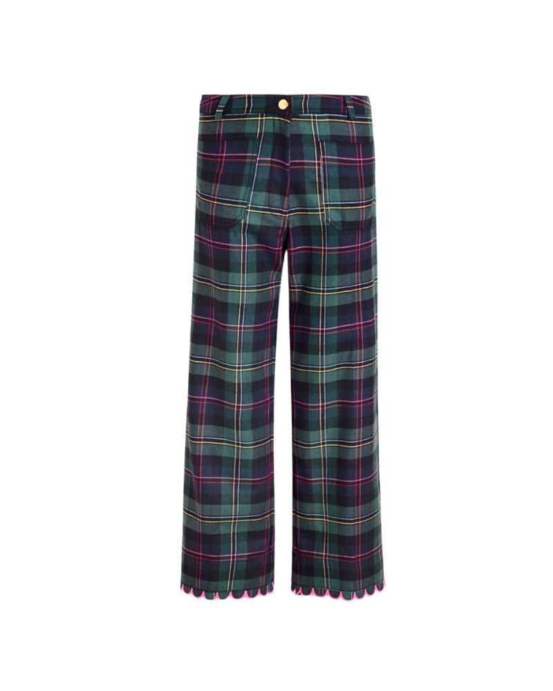 Close-up of pink scalloped edging on tartan trousers by Vilagallo
