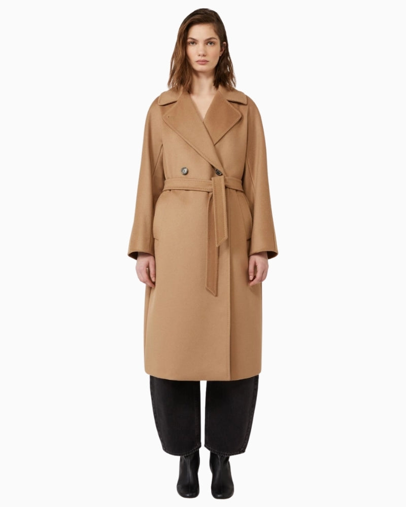 Resina belted wool coat styled over a winter outfit for a polished look