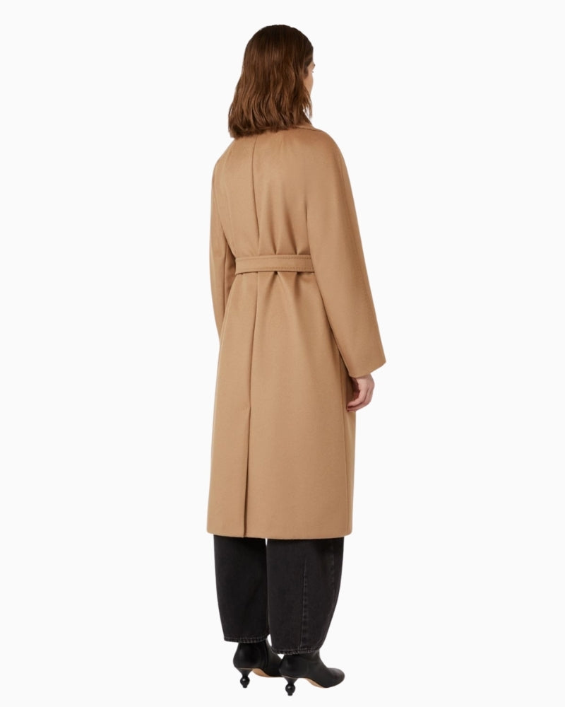 Back view of Resina coat showing straight cut and belt detail
