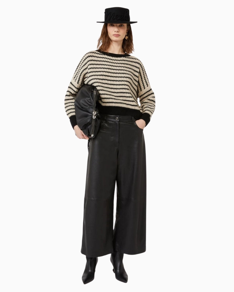 Ezor cropped wool jumper styled with high-waisted trousers for a modern winter look