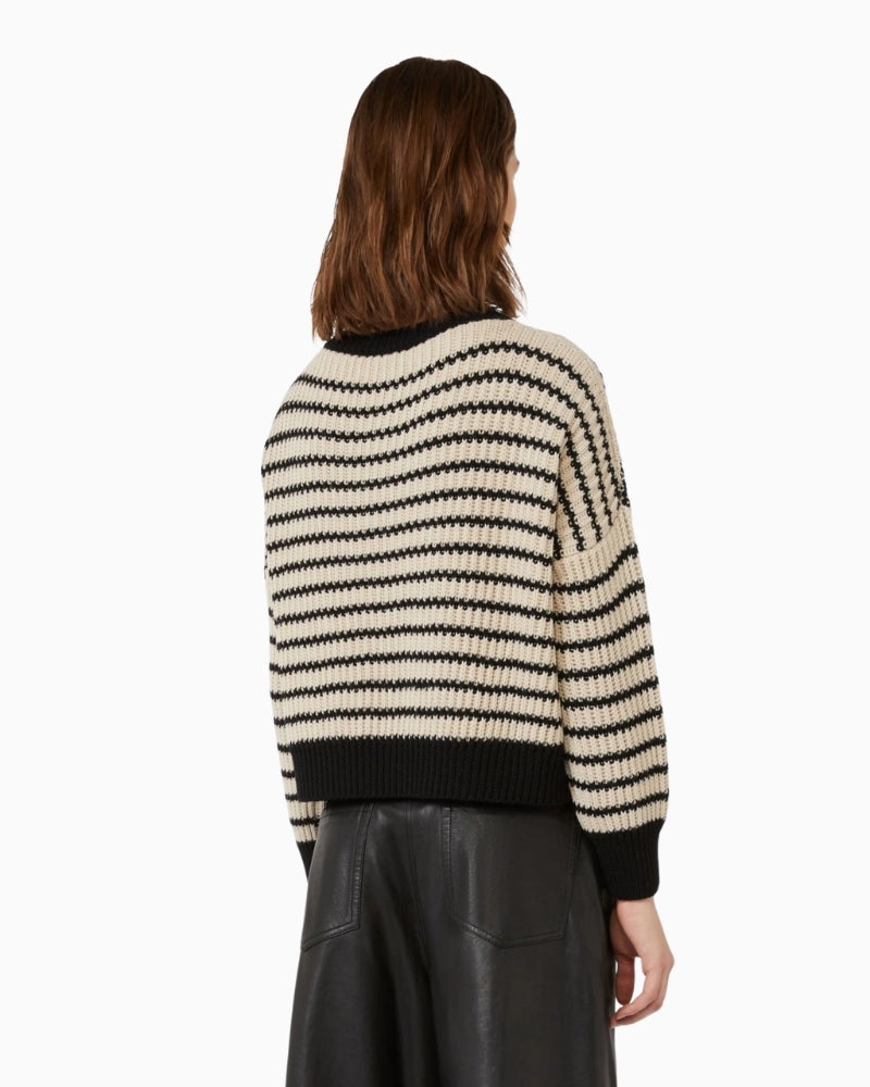 Back view of cropped oversized jumper showing ribbed hem and dropped shoulders