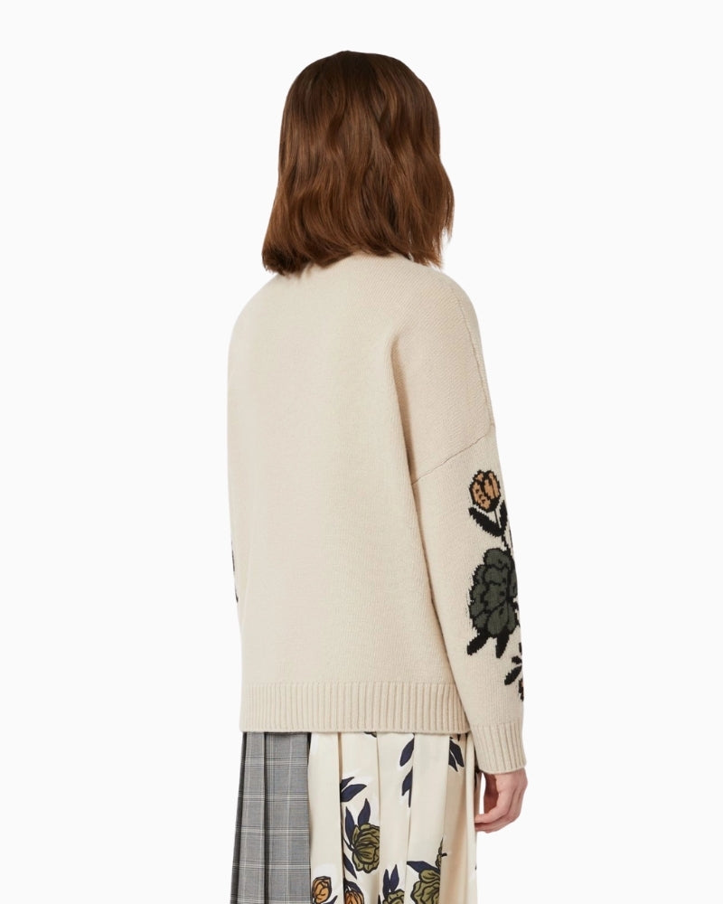 Back view of ecru wool jumper showing wide fit and ribbed hem
