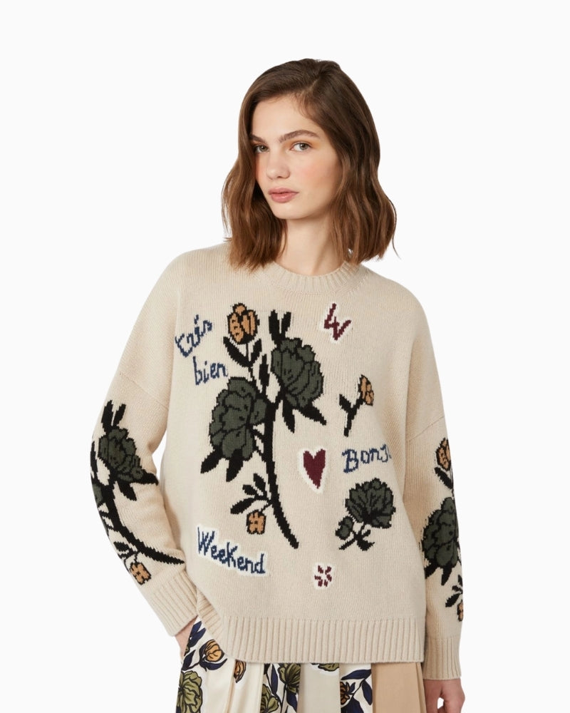 Back view of ecru wool jumper showing wide fit and ribbed hem