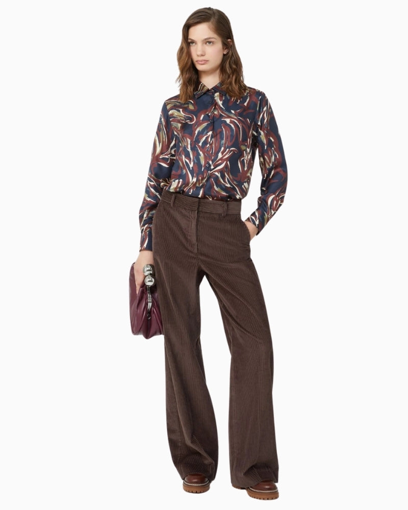 Weekend Max Mara silk shirt styled with trousers for an elegant look