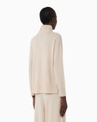 Side view of Weekend Max Mara jumper showing side slits and relaxed fit