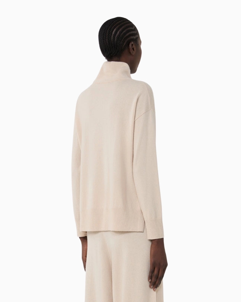 Side view of Weekend Max Mara jumper showing side slits and relaxed fit