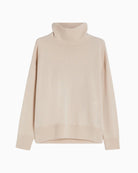 Front view of Scrivia knit with crater neckline and long sleeves