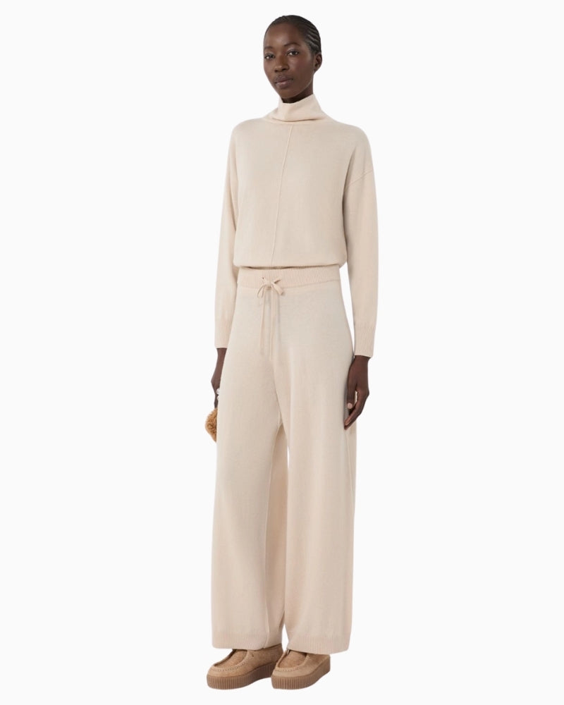 Weekend Max Mara beige jumper styled casually with jeans