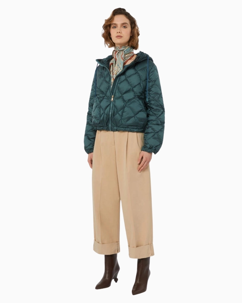 Weekend Max Mara Eris jacket styled casually with jeans for a cosy winter look