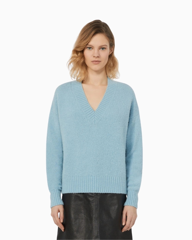 Front view of light blue alpaca blend V-neck jumper by Weekend Max Mara with relaxed fit and ribbed edges