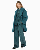 Tania wide-leg trousers styled with a tucked-in blouse for a smart winter outfit