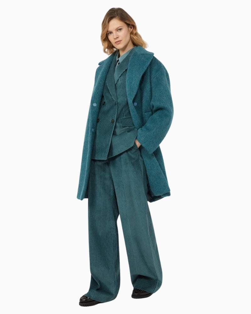 Tania wide-leg trousers styled with a tucked-in blouse for a smart winter outfit