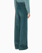 Back view of Tania velvet trousers showing welt pockets and belt loops