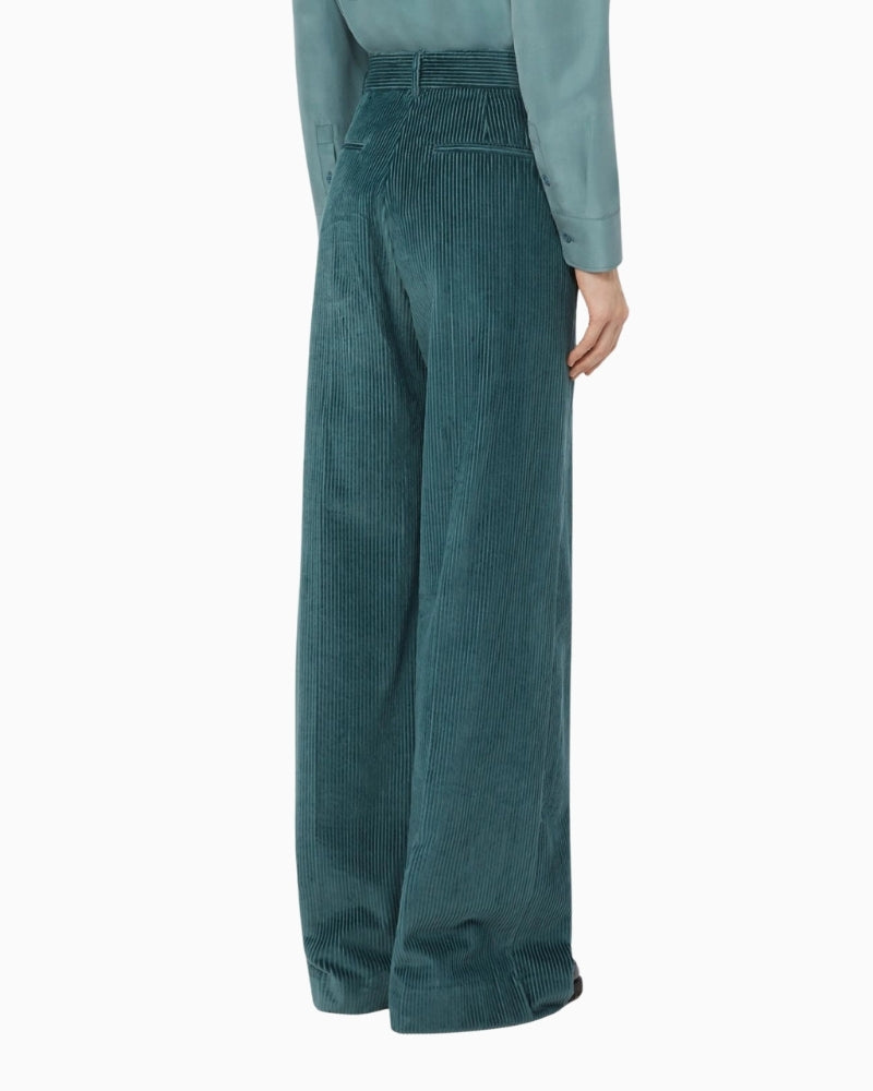Back view of Tania velvet trousers showing welt pockets and belt loops