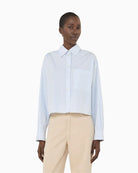Weekend Max Mara Deden shirt light blue front view woman wearing – Áines Boutique