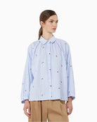 Weekend Max Mara poplin embroidered shirt light blue, woman wearing front view – Áines Boutique