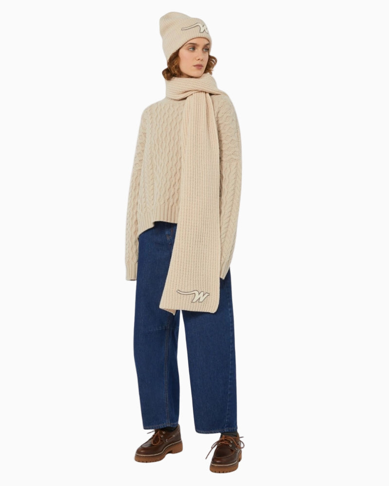 Model wearing Weekend Douglas Barrel-Leg Jeans paired with sweater