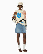 Woman wearing Weekend Max Mara patterned cotton knit multicolour, side view – Áines Boutique