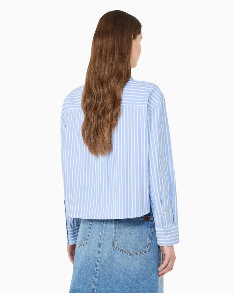 Woman wearing Weekend Max Mara striped cotton shirt light blue, back view – Áines Boutique