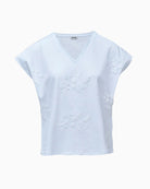 White cotton T-shirt embroidered detail close up