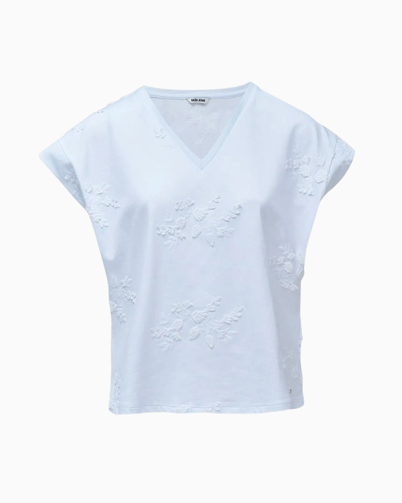 White cotton T-shirt embroidered detail close up