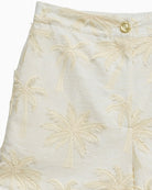 White cotton shorts with three dimensional embroidery close up fabric detail